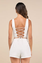 Exceptionally Styled Ivory Lace-Up Two-Piece Skort Romper